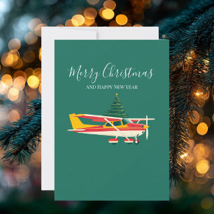 Cessna-Flugzeug trägt Weihnachtsbaum-Foto Lustig Feiertagskarte