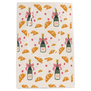 Champagner und Croissants Mittlere Geschenktüte