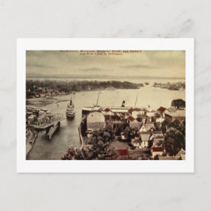 Charlevoix, Michigan, mit Fluss und Hafen Postkarte