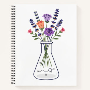 Chemiekolben mit Lavendel und Rose A Notizbuch