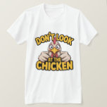 Chicken Game - Dont Look At The Chicken  T-Shirt<br><div class="desc">Bold cartoon chicken graphic with playful typography in a vibrant yellow palette,  delivering cheeky humor. Ideal for novelty tees and casual apparel for chicken lovers and punchy streetwear vibes.</div>