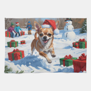 Chihuahua läuft im Schnee mit Weihnachtsmütze Geschirrtuch