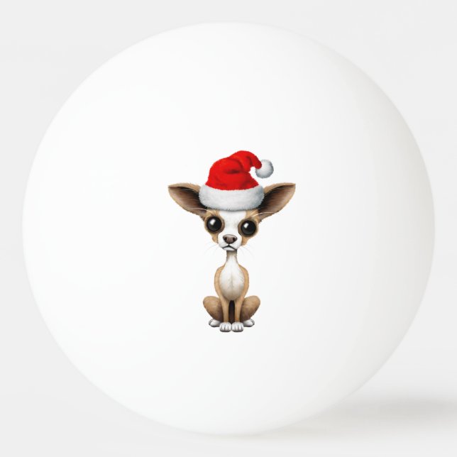 Chihuahua-Welpe, der eine Weihnachtsmannmütze Tischtennisball (Vorderseite)