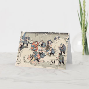 Chinesische Kinder machen Schneebälle Feiertagskarte