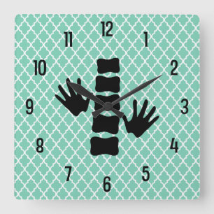 Chiropraktische Handschuhe und Wandleuchte mit Spi Quadratische Wanduhr