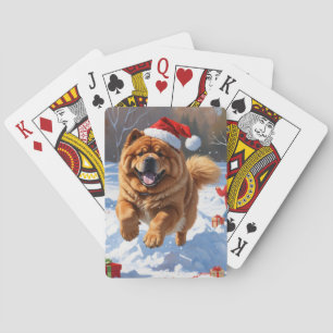 Chow Chow läuft im Schnee mit Weihnachtsmütze Spielkarten