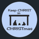 CHRIST in CHRISTmas Stickers behalten (2 Größen)<br><div class="desc">Sehr einfache Krippe,  blauer Hintergrund,  Silhouetten. Baby Jesus wird mit leichten gelben Lichtstrahlen betont. Behalt CHRIST in CHRISTmas.</div>