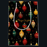 Christmas Bauble Ornament Bright Mittlere Geschenktüte<br><div class="desc">Eine farbenfrohe Weihnachtsgeschenktasche,  mit einem Design von glänzenden Baum-Ornamenten in leuchtenden Farben von goldrot und blau,  alles auf einem schwarzen Hintergrund. Die Formulierung "Frohe Weihnachten" in goldfarbenem Schriftart kann mit jedem Gruß nach Bedarf angepasst werden oder personalisieren mit einem Namen.</div>