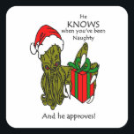 Christmas Cthulhu Square Sticker<br><div class="desc">Weihnachten Cthulhu mit Weihnachtsmannmütze und hell verpackt Weihnachten Geschenk. Er weiß,  wann du unartig warst,  und er stimmt zu!</div>