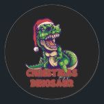 Christmas Green Dinosaurier | Dinosaurier-Design Runder Aufkleber<br><div class="desc">Wärmen Sie mit einem heißen Getränk auf und setzen Sie eines unserer Weihnachtsdinosaurier-Designs auf,  um Ihr Lieblingsmämmer aus Ihrer Jugend zu zeigen. Die Freuden der Welt sind deine!</div>