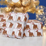 Christmas Irish Setter Geschenkpapier<br><div class="desc">Irish Setter Hund in Schneeflocke mit Hut des Weihnachtsmanns. Die Farbe des roten Hintergrunds kann geändert werden.</div>