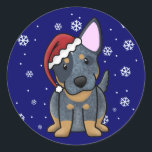 Christmas Kawaii Blue Heeler Runder Aufkleber<br><div class="desc">Adorable Blue Heeler Geschenke mit einem Cartoon des blauen australischen Rinderhundes mit einer Santa Cap,  mit hellblauen Schneeflocken im Hintergrund. Fügen Sie einfach Ihren eigenen Text zu diesem Design mit unserem Tool "Anpassen" hinzu. Phantastische saisonale Rinderhundartikel für diese Urlaubssaison!</div>