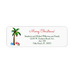 Christmas Palm Tree Lights Tropical Island Beach<br><div class="desc">Palme mit Weihnachtsbaumleuchten, und Geschenke darunter. Ein lustiges tropisches Strand- oder Inselthema, als Weihnachtsdesign in den Ferienfarben Rot und Grün. Frohe Weihnachten ist geschrieben als Gruß oder Wechsel zu Happy Holidays oder irgendeine kurze Formulierung. Personalisieren Sie einfach mit Ihrem Familiennamen und Ihrer Adresse oder einer beliebigen Formulierung bis zu 4...</div>