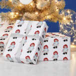 Christmas Rag Doll auf Weiß Geschenkpapier<br><div class="desc">Alte Puppe mit Weihnachtskandinken in Schürze Tasche auf weißem Hintergrund.</div>