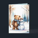 Christmas Teddy Bär und Snowman Feiertagskarte<br><div class="desc">Niedlicher Teddybär in Aquarellfarbe im Winterwald mit Schneemann. Text ist bearbeitbar.</div>