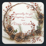 Christmas Twig Wreath Red Berries Pinecones Quadratischer Aufkleber<br><div class="desc">Schöne, rote Beeren mit Aquarellfarben schmücken einen hübschen Rahmen aus Zweigen, Weinreben und Kiefernästen. Lieblicher Weihnachtsaufkleber für all Ihre Urlaubsgeschenke. Text kann in ein To: From: Aufkleber geändert werden. Ideal für Weihnachtskekse, Süßigkeiten, Fudge oder Kuchen. Yummy Leckereien für jeden in diesem Urlaub machen? Passen Sie den Text an, um ihn...</div>