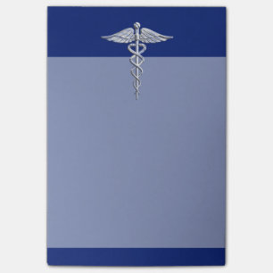 Chrom mag Caduceus-medizinisches Symbol auf blauem Post-it Klebezettel