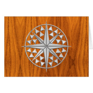 Chrome Like Nautical Compass Star on Teak Veneer