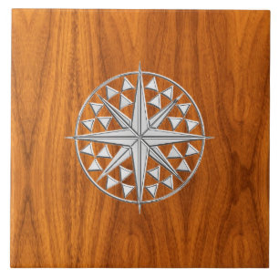 Chrome Like Nautical Compass Star on Teak Veneer Fliese