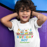 Circus Animal Train Niedliche Custom Birthday Boy T-Shirt<br><div class="desc">Dieser bezaubernde Zirkustiergeburtstag thematisiert T - Shirt zeigt Zootiere auf Safari. Der Zug enthält eine Giraffe,  Elefanten,  Tiger und einen niedlichen Hippo über dem in Orange,  Grün,  Rot und Blau geschriebenen Text Birthday Boy. Personalisieren Sie mit dem Namen Ihres Kindes für ein Kind,  das ein lustiges Party hat.</div>