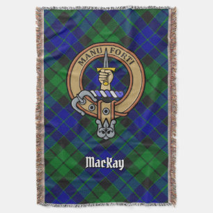 Clan MacKay-Wappen über Tartan Decke
