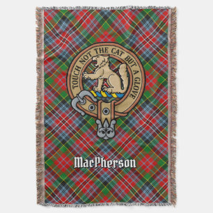 Clan MacPherson-Wappen über Tartan Decke