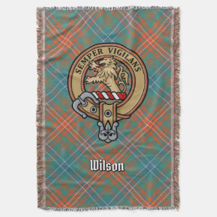 Clan Wilson-Wappen über altem Tartan Decke