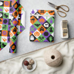 Classic Orange, Green And Purple Halloween Themed Geschenkpapier<br><div class="desc">Celebrate the season with this vibrant and fun classic Halloween Wrapping Paper, a vibrant tapestry of the season's most enchanting colors and iconic symbols. This eye-catching design features a dynamic harlequin pattern, where each diamond is a burst of green, orange, purple, black, or white. Within each colorful block, a different...</div>