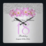 Classy Silver & Belladonna Lilies 18th Birthday   Quadratische Wanduhr<br><div class="desc">Beautiful classy and stylish Birthday wall clock. This example has been designed for 18 years, but is suitable for any age. A glamorous design with a silver glitter and gradient background with a pretty silver ribbon to separate the two images, over the ribbon is a printed image of a beautiful...</div>