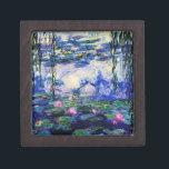 Claude Monet-Wasser-Lilien Schachtel<br><div class="desc">Meisterwerk der feinen Kunst durch Claude Monet (1840 - 1926) seine populären Landschaftsmalerei Wasser-Lilien kennzeichnend basiert auf Schatten von Blauem,  von Grünem und von Lila. Sie stellt ein würdevolles Schmuckkästchen für Fans von Claude Monet,  von Impressionismus und von wirklicher schöner Kunst her.</div>