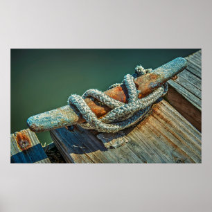 Close-up of boat cleat and rope poster