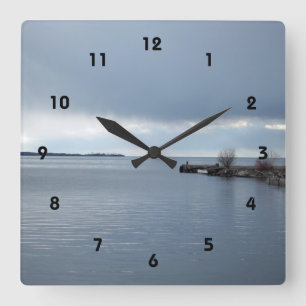 cloudy lake waterfront quadratische wanduhr