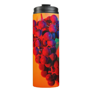 Cluster aus blauer Traube in orangefarbenem Neonli Thermosbecher
