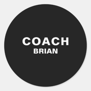 Coach schwarzes T-Shirt mit fettem Text Runder Aufkleber