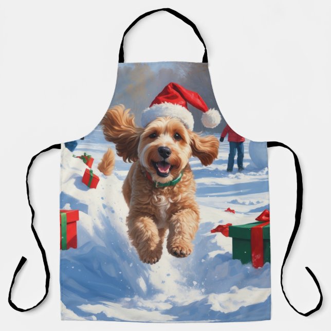 Cockapoo läuft im Schnee mit Weihnachtsmütze Schürze (Vorderseite)