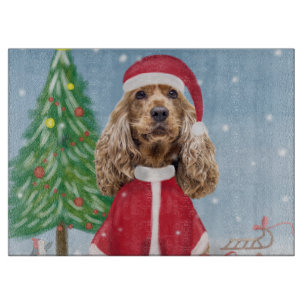 Cocker Spaniel Hund im Schnee mit Weihnachtsgesche Schneidebrett