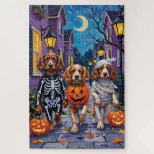 Cocker Spaniel Hunde beim Trick-or-Treat an Hallow Puzzle