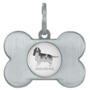 Cocker Spaniel in Schwarz-Weiß & Telefonnummer Tiermarke