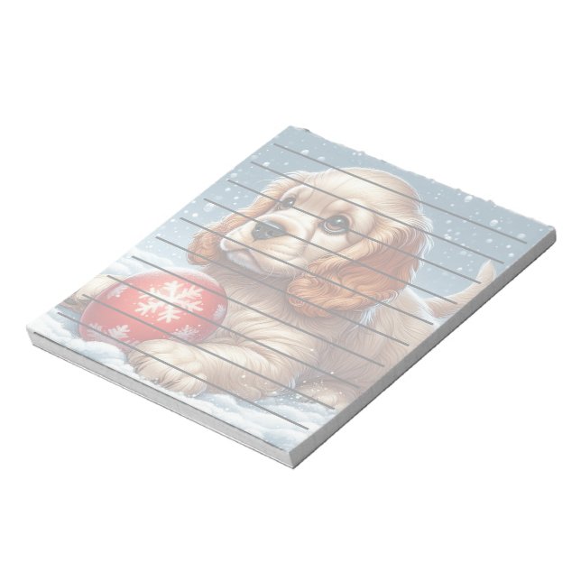 Cocker Spaniel Welpe auf Schnee mit einer Kugel Notizblock (Rotiert)