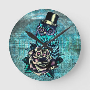 Colorful textured owl illustration on teal base. runde wanduhr