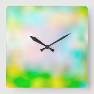 Colourful blurred flowers quadratische wanduhr