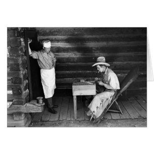 Cook beim Kartenspielen eines Cowboys