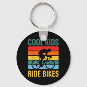 Coole Kinder fahren Fahrrad Retro-Jugendfahrrad Ra Schlüsselanhänger