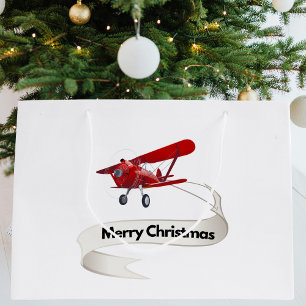 Cooles Flugzeug mit Frohe Weihnachten-Banner Große Geschenktüte