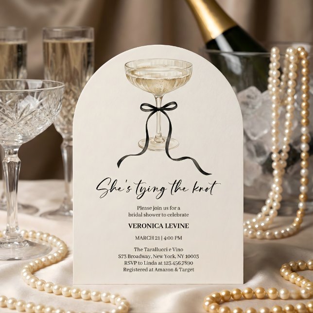 Coquette Bow She’s Tying the Knot Bridal Shower  Einladung (She’s Tying the Knot Bridal Shower - Champagne Coupe Bow, Modern Arch)