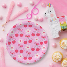 Coquette Cherries mit roten Bögen und weißen Blume