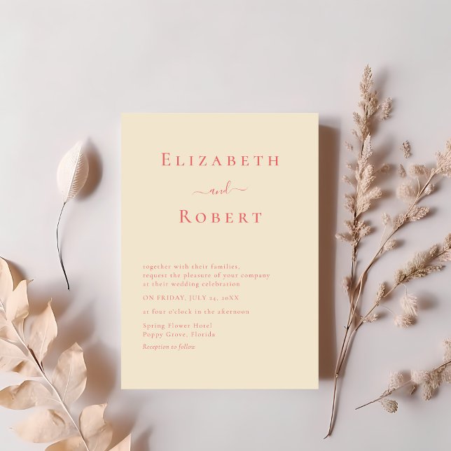 Coral Modern Minimalistische Skripteinladung Einladung (Coral Modern Minimalist Script Wedding Invitation on a table with soft pink dry flowers)