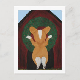 Corgi hängt Weihnachtskränze an das Hundehaus Postkarte