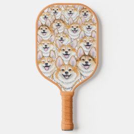 Corgis auf einem Pickleball Paddle