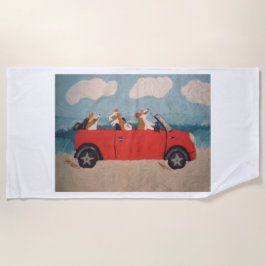 Corgis in rotem Auto am Strand Strandtuch